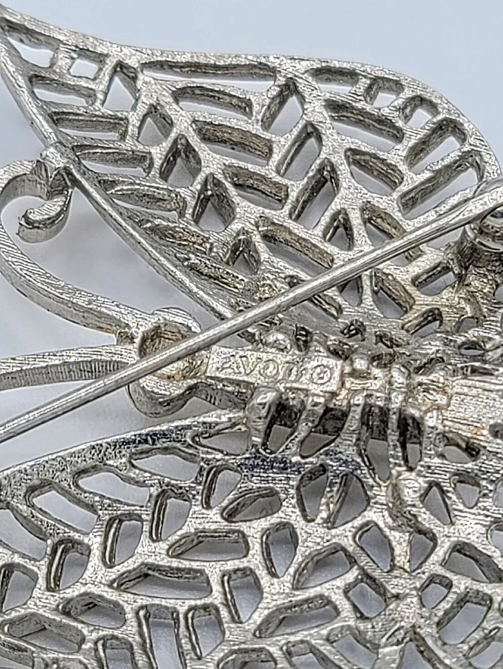 Avon Butterfly Brooch Two Tone Gold Silver Openwork Blue Rhinestone Eyes Vintage